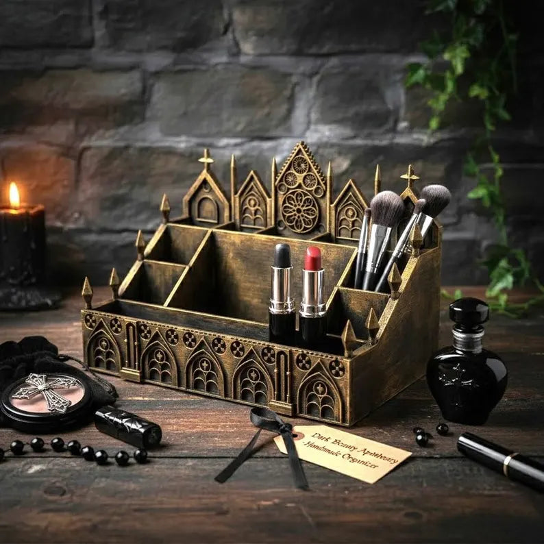 Antique gold Gothic makeup organizer with cathedral arches and compartments for brushes and cosmetics
