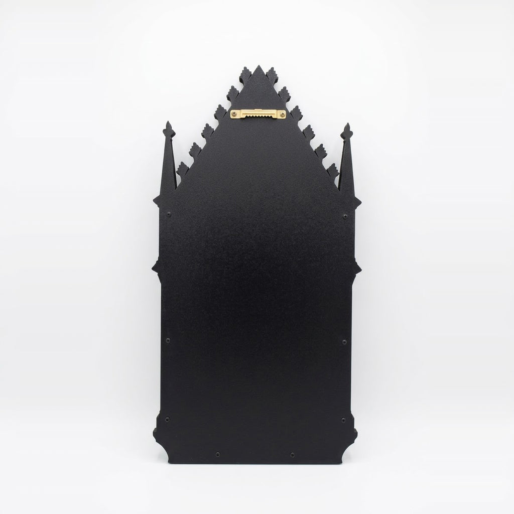 Back view of antique gold Gothic cathedral arch mirror