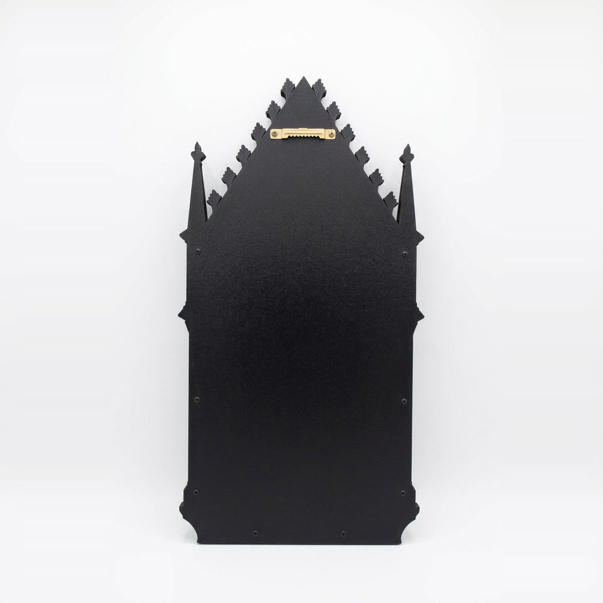 Back view of antique gold Gothic cathedral arch mirror